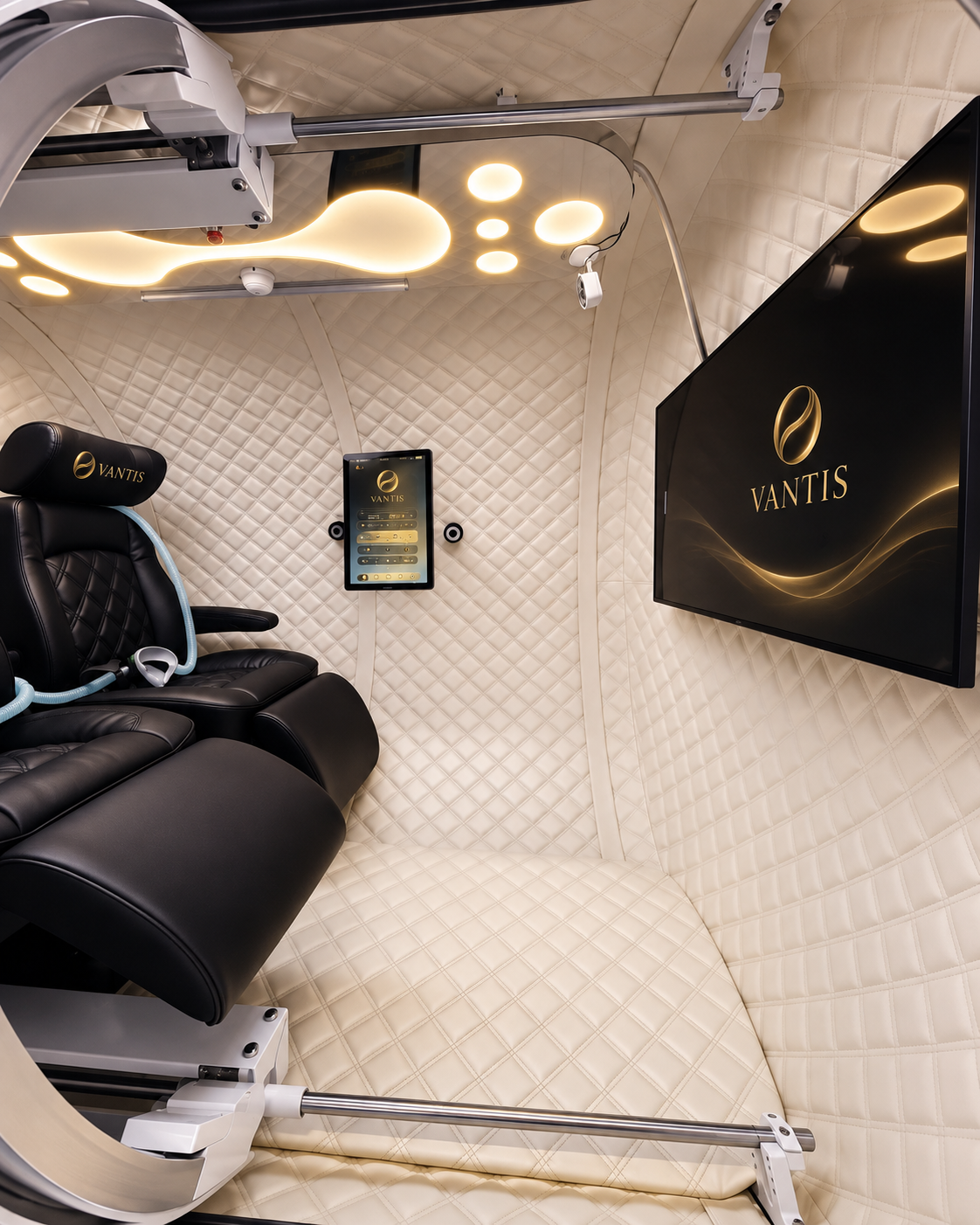 Quilted cream interior of the Vantis Meridian 2 with wall-mounted screen and control tablet
