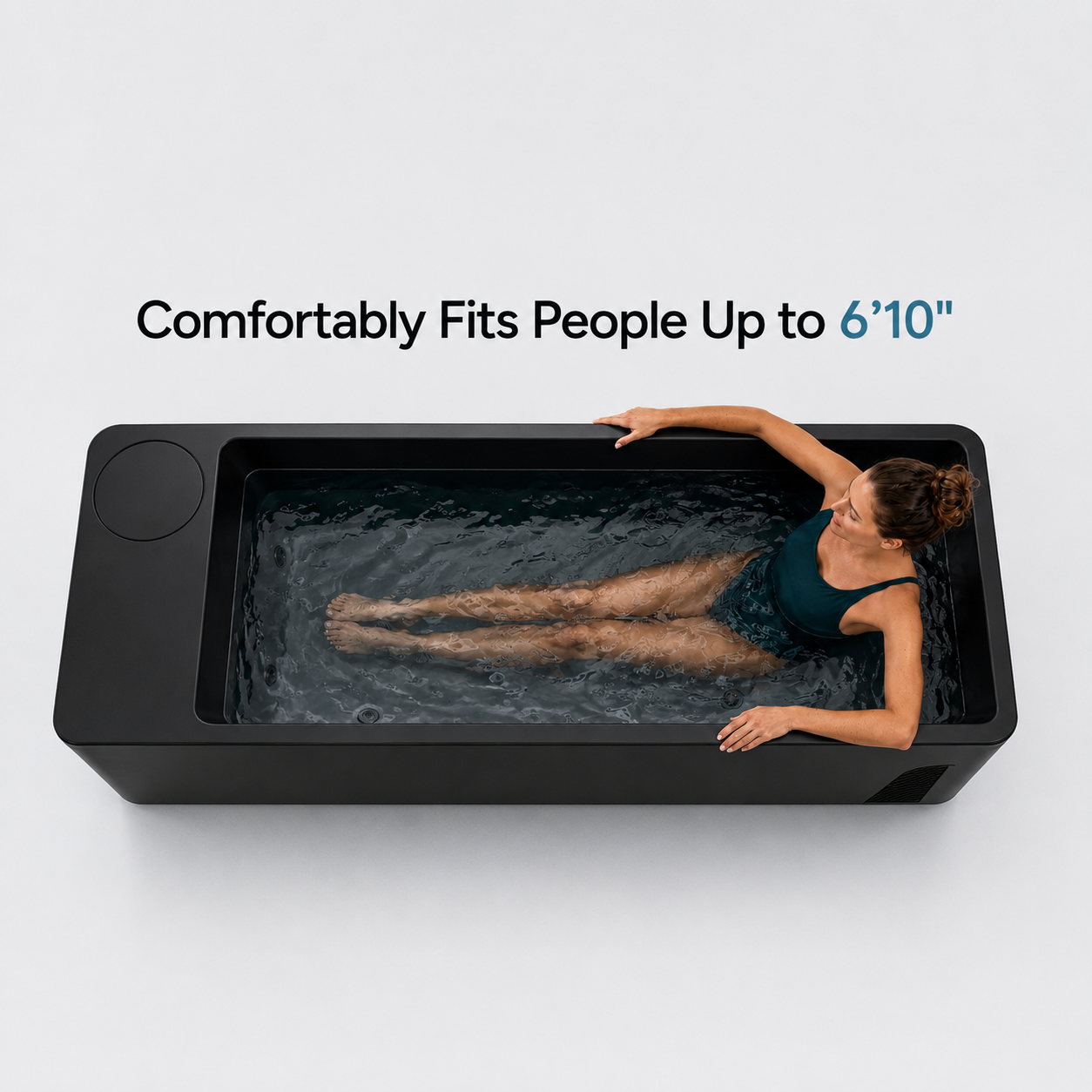 Overhead view of the Vantis Zero basin with an adult reclined full length in the water